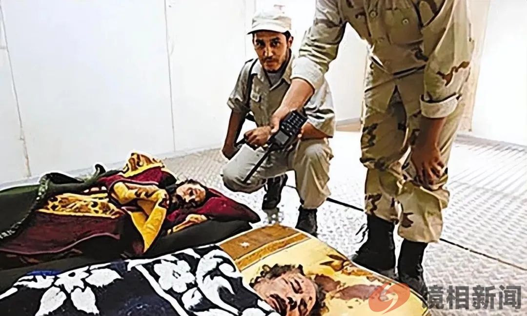 卡扎菲临死前惨状:被拖行40多米,手抹眼泪求饶,士兵拿手机拍照(图9) 微信图片_20230628163850.jpg