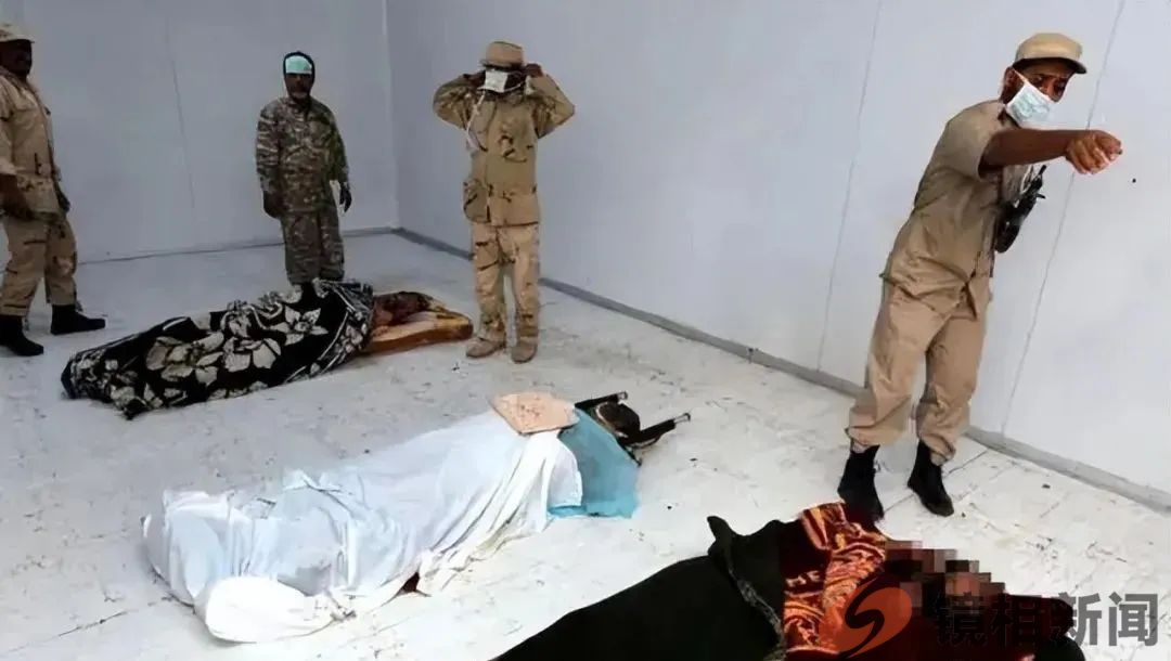卡扎菲临死前惨状:被拖行40多米,手抹眼泪求饶,士兵拿手机拍照(图20) 微信图片_20230628164021.jpg